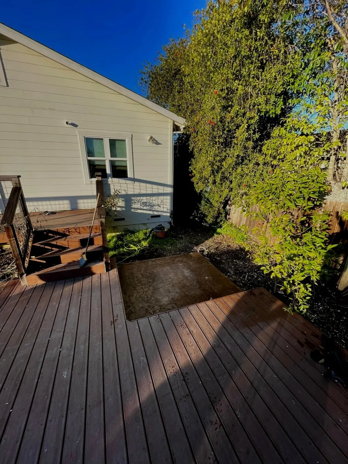 An empty square pad on an outdoor deck