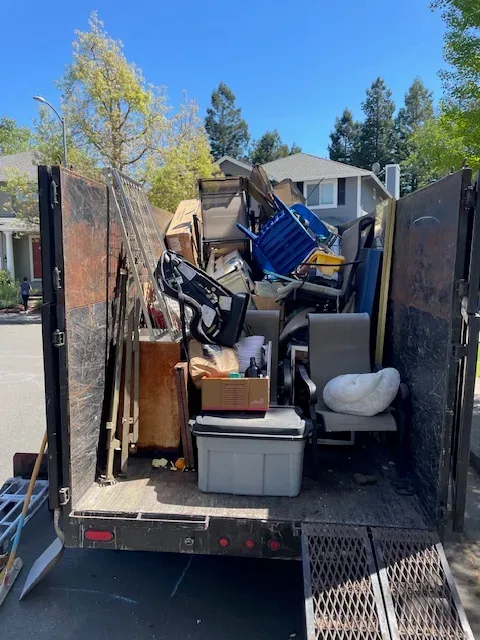 Household furniture loaded inside a hauling trailer